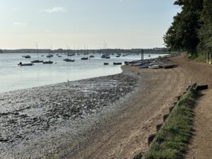 small boats pulled up onto the foreshore